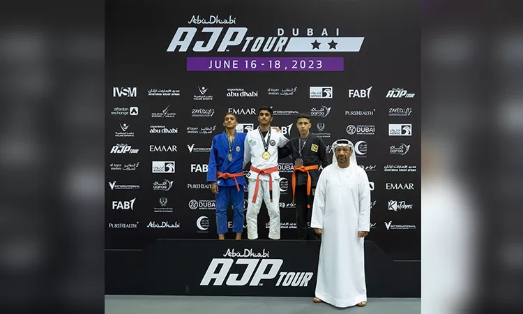 Winners with Mohamed Salem Al Dhaheri, Deputy Chairman of UAE Jiu-Jitsu Federation, during the presentation ceremony.